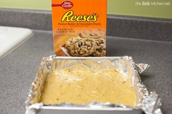 Peanut Butter & Chocolate Chunk Snack Cakes with Peanut Butter Frosting from thelittlekiitchen.com