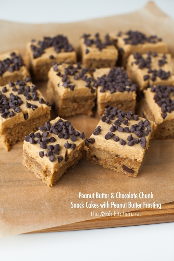 Peanut Butter & Chocolate Chunk Snack Cakes with Peanut Butter Frosting from thelittlekiitchen.com