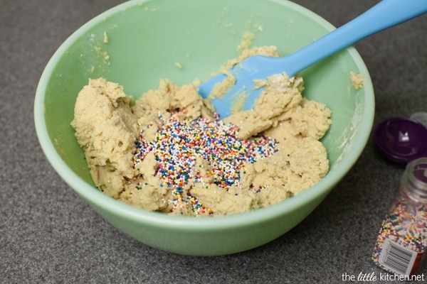 Dark Chocolate Dipped Funfetti Shortbread Cookies from thelittlekiitchen.com