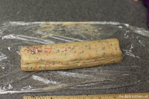 Dark Chocolate Dipped Funfetti Shortbread Cookies from thelittlekiitchen.com