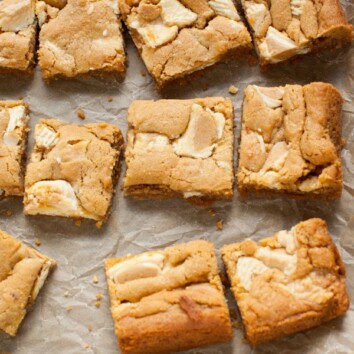 These bars are so easy to make...the crust is made with graham cracker crumbs & I used white chocolate Reese's butter cups! Peanut Butter Cookie Pie Bars from thelittlekiitchen.com