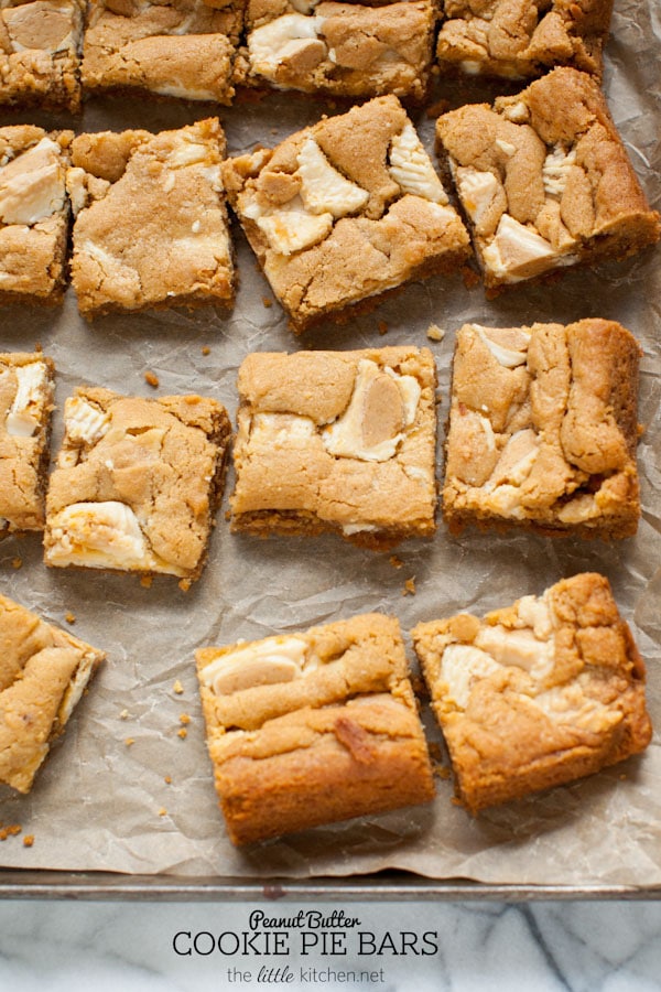 These bars are so easy to make...the crust is made with graham cracker crumbs & I used white chocolate Reese's butter cups! Peanut Butter Cookie Pie Bars from thelittlekiitchen.com