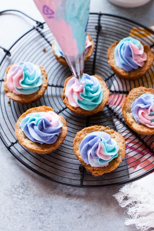 Chocolate Chip Cookie Cups with Unicorn Frosting from thelittlekiitchen.com
