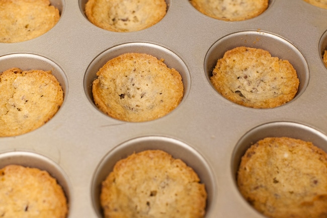 Chocolate Chip Cookie Cups with Unicorn Frosting from thelittlekiitchen.com