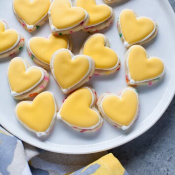 Yellow Heart-Shaped Rainbow Funfetti Cookies from thelittlekiitchen.com