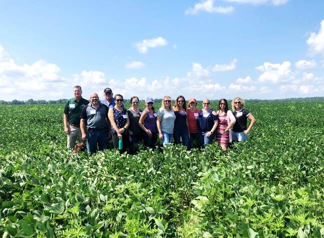 Group standing in a soy bean field with blue sky in the background for the Best Food Facts Tour thelittlekiitchen.com