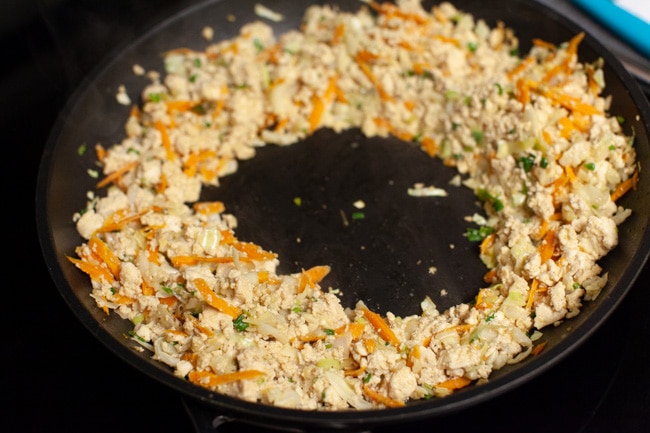Vegetarian Dumpling filling pushed to the sides of a skillet from thelittlekiitchen.com
