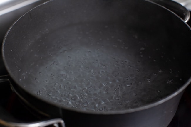 a pot of boiling water with baking soda